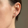 Hammered dot stud earrings 5mm small circle earrings gold filled on model
