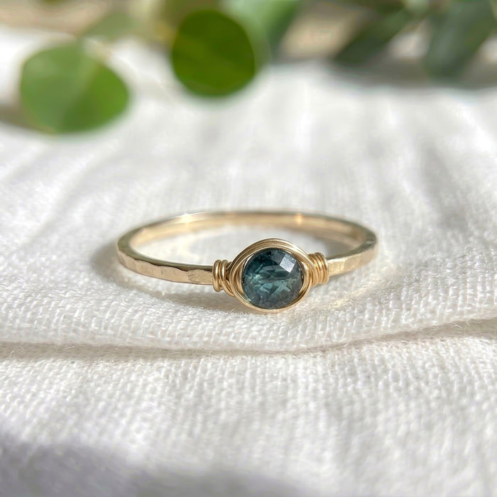 London blue topaz dainty wire wrapped bezel stacking ring angle view gold filled