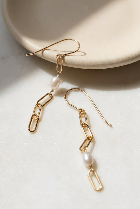 Paperclip chain and pearl mismatched drop earrings on model 14k gold filled alternate view