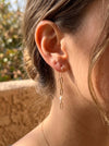 Asymmetrical paperclip chain freshwater pearl drop earrings gold filled on model