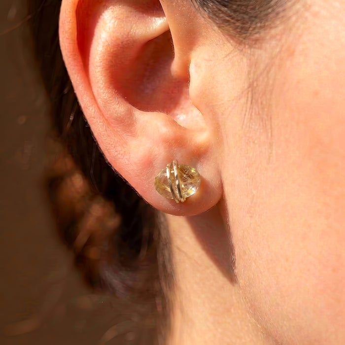 Gold rutilated quartz oval saturn stud earrings gold filled on model