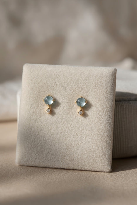 Dainty two stone aquamarine and white topaz stud earrings, gold vermeil