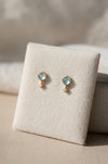Aquamarine and topaz stud earrings gold vermeil on velvet display angle view