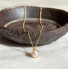 Dainty pearl charm pendant necklace solid 14k gold close up