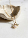 Dainty pearl and aquamarine two charm pendant necklace solid 14k gold angle view