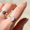Blue flash moonstone floating oval wire wrapped ring gold filled on hand