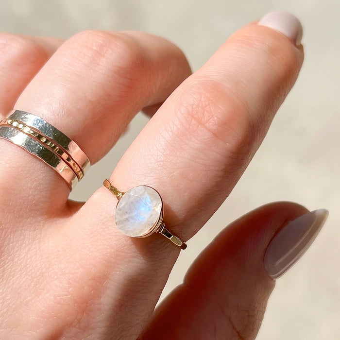 Blue flash moonstone floating oval wire wrapped ring gold filled on hand