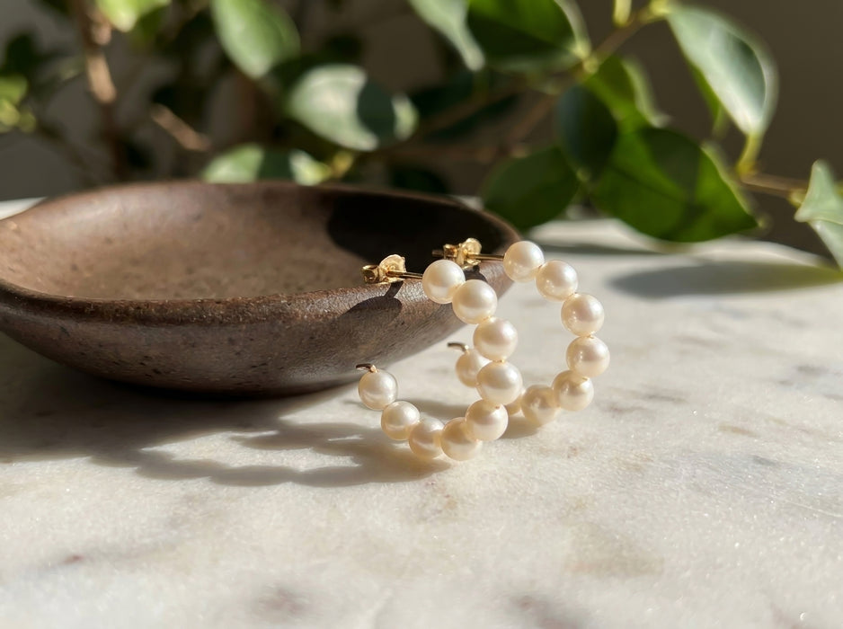 Freshwater pearl everyday minimalist gold filled small hoops on marble background
