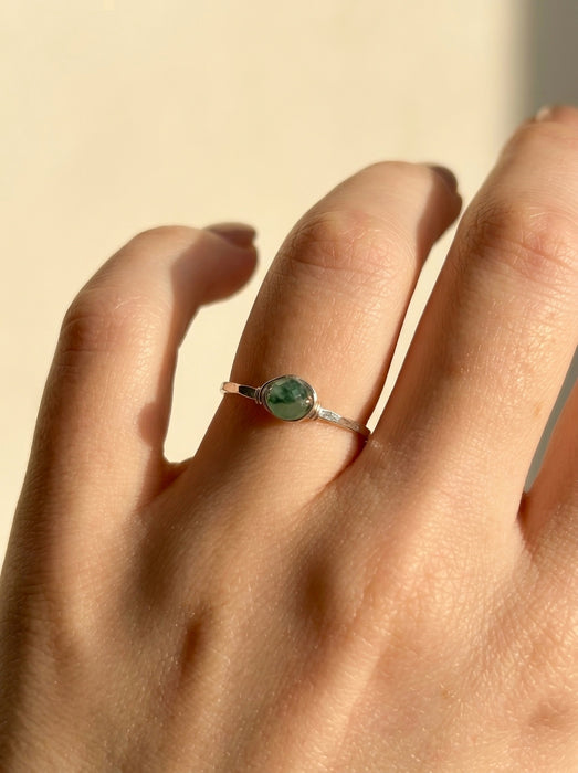 Green jade two tone dainty stacking ring sterling silver on hand