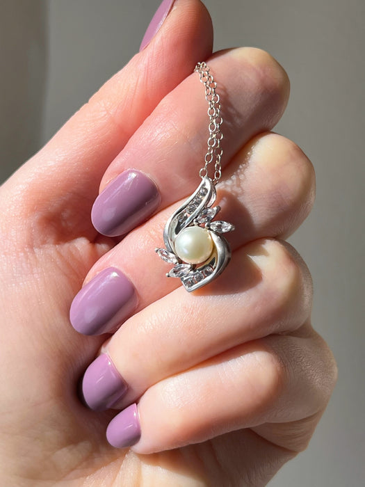 Vintage white sapphire and pearl cluster necklace sterling silver on hand